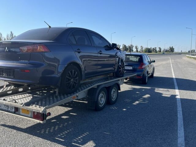 Синій Міцубісі Lancer, об'ємом двигуна 1.5 л та пробігом 240 тис. км за 3292 $, фото 1 на Automoto.ua