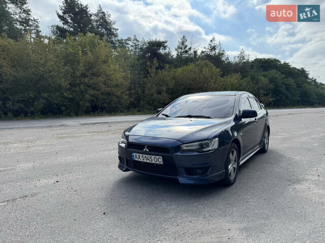 Синій Міцубісі Lancer, об'ємом двигуна 2 л та пробігом 299 тис. км за 7100 $, фото 1 на Automoto.ua