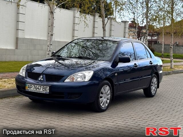 Синій Міцубісі Lancer, об'ємом двигуна 1.6 л та пробігом 85 тис. км за 7100 $, фото 1 на Automoto.ua