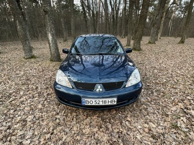 Синий Мицубиси Лансер, объемом двигателя 1.6 л и пробегом 188 тыс. км за 3900 $, фото 1 на Automoto.ua