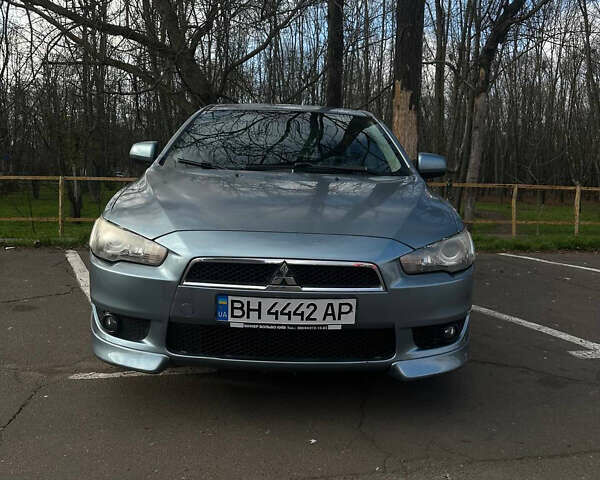 Синий Мицубиси Лансер, объемом двигателя 1.5 л и пробегом 250 тыс. км за 5150 $, фото 1 на Automoto.ua