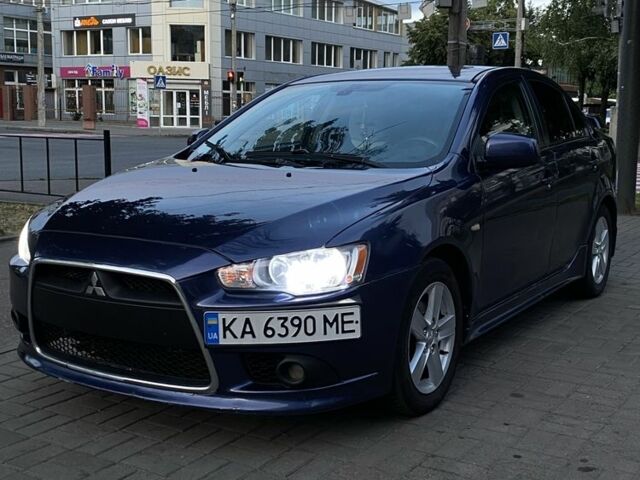 Синий Мицубиси Лансер, объемом двигателя 2 л и пробегом 245 тыс. км за 5800 $, фото 1 на Automoto.ua