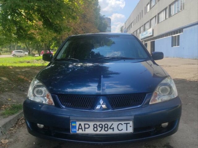 Синій Міцубісі Lancer, об'ємом двигуна 1.6 л та пробігом 207 тис. км за 5200 $, фото 1 на Automoto.ua