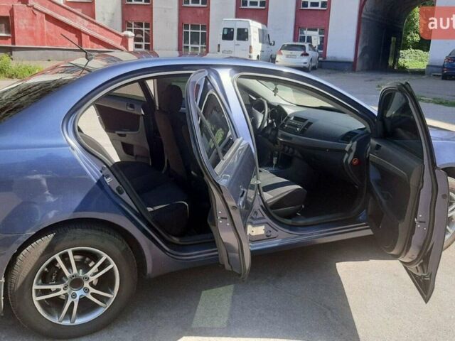 Синій Міцубісі Lancer, об'ємом двигуна 1.5 л та пробігом 240 тис. км за 7800 $, фото 1 на Automoto.ua