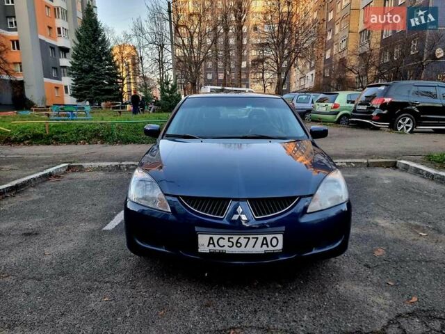 Синій Міцубісі Lancer, об'ємом двигуна 1.6 л та пробігом 298 тис. км за 2998 $, фото 1 на Automoto.ua