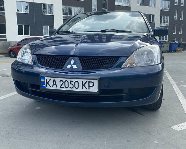 Синій Міцубісі Lancer, об'ємом двигуна 1.6 л та пробігом 206 тис. км за 5500 $, фото 1 на Automoto.ua