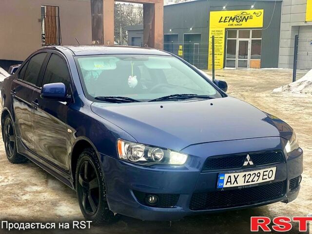 Синий Мицубиси Лансер, объемом двигателя 2 л и пробегом 20000 тыс. км за 7200 $, фото 1 на Automoto.ua