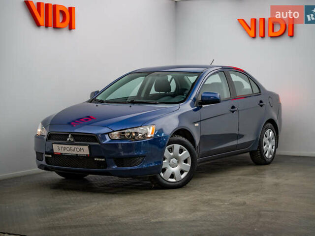 Синий Мицубиси Лансер, объемом двигателя 1.5 л и пробегом 65 тыс. км за 8076 $, фото 1 на Automoto.ua