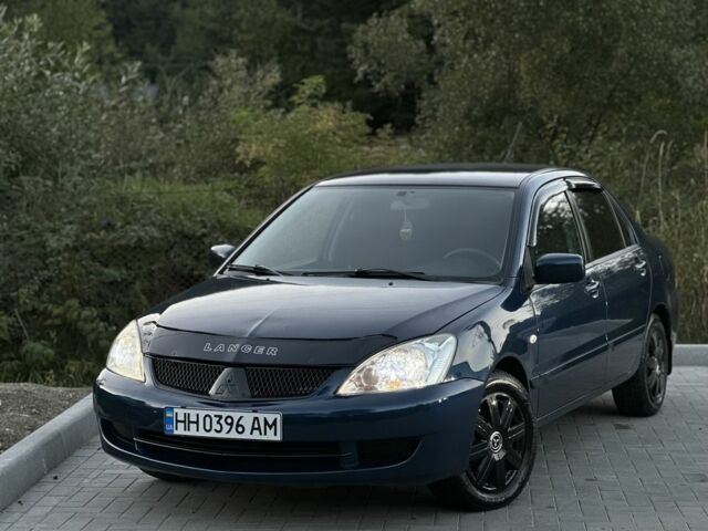 Синий Мицубиси Лансер, объемом двигателя 1.6 л и пробегом 138 тыс. км за 4800 $, фото 1 на Automoto.ua