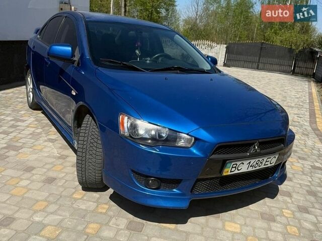 Синий Мицубиси Лансер, объемом двигателя 2 л и пробегом 220 тыс. км за 6000 $, фото 1 на Automoto.ua
