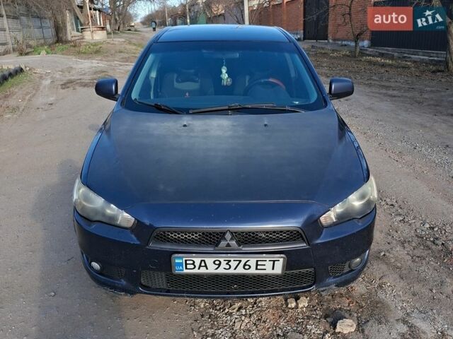 Синий Мицубиси Лансер, объемом двигателя 2 л и пробегом 248 тыс. км за 6600 $, фото 1 на Automoto.ua