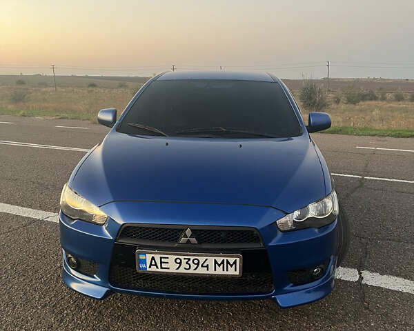 Синій Міцубісі Lancer, об'ємом двигуна 2 л та пробігом 240 тис. км за 3500 $, фото 1 на Automoto.ua