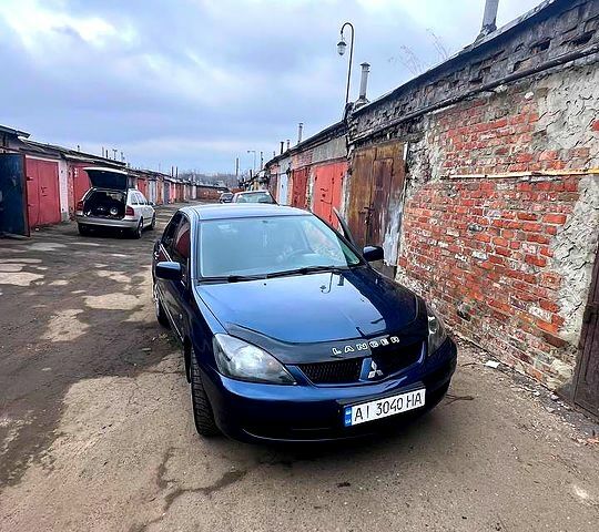 Синий Мицубиси Лансер, объемом двигателя 1.6 л и пробегом 189 тыс. км за 4200 $, фото 1 на Automoto.ua