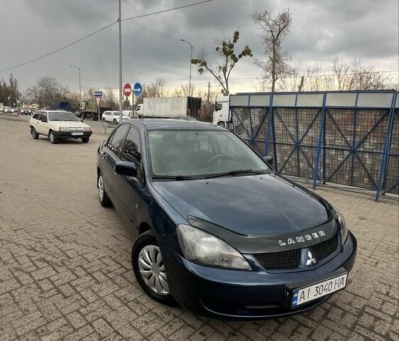 Синій Міцубісі Lancer, об'ємом двигуна 1.6 л та пробігом 185 тис. км за 4500 $, фото 1 на Automoto.ua