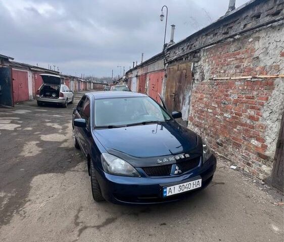 Синий Мицубиси Лансер, объемом двигателя 1.6 л и пробегом 180 тыс. км за 4200 $, фото 1 на Automoto.ua