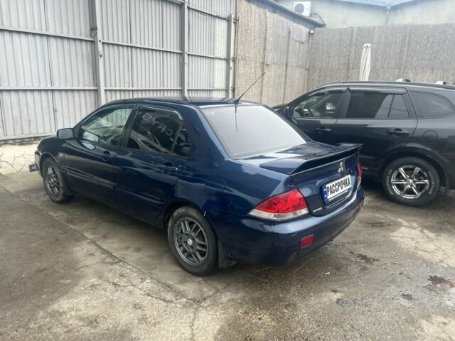 Синій Міцубісі Lancer, об'ємом двигуна 1.6 л та пробігом 140 тис. км за 3300 $, фото 1 на Automoto.ua