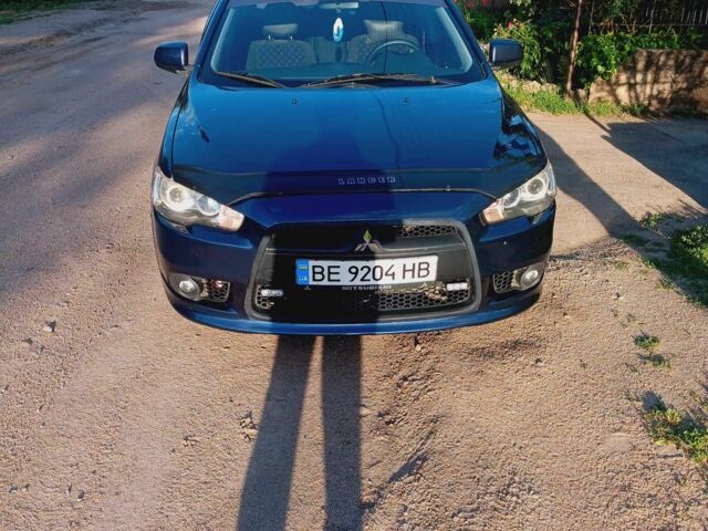 Синій Міцубісі Lancer, об'ємом двигуна 2 л та пробігом 237 тис. км за 6267 $, фото 1 на Automoto.ua