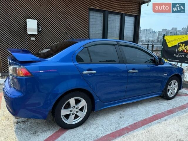 Синий Мицубиси Лансер, объемом двигателя 2 л и пробегом 192 тыс. км за 8000 $, фото 1 на Automoto.ua