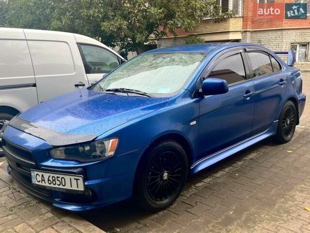 Синій Міцубісі Lancer, об'ємом двигуна 2 л та пробігом 197 тис. км за 5900 $, фото 1 на Automoto.ua