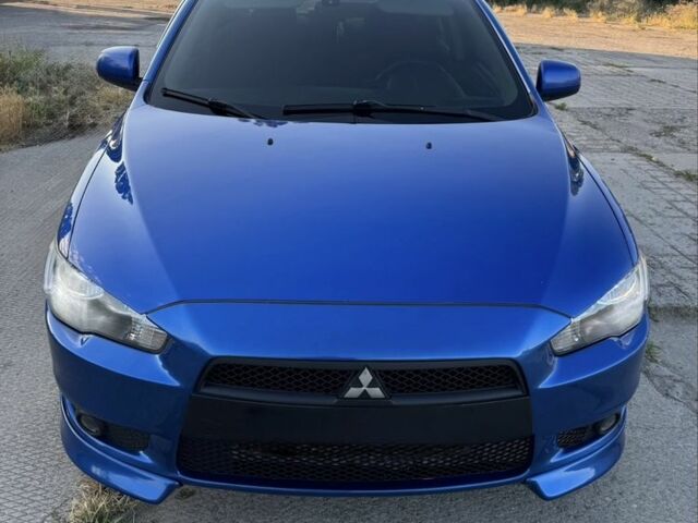 Синій Міцубісі Lancer, об'ємом двигуна 2 л та пробігом 266 тис. км за 7000 $, фото 1 на Automoto.ua