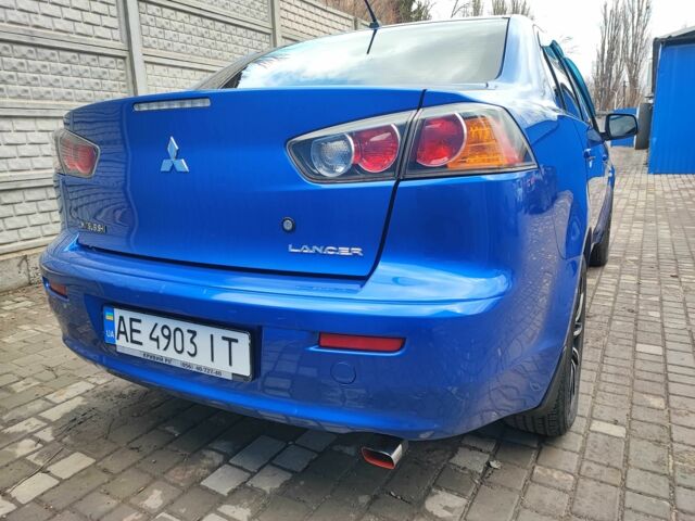 Синий Мицубиси Лансер, объемом двигателя 1.5 л и пробегом 141 тыс. км за 6600 $, фото 1 на Automoto.ua