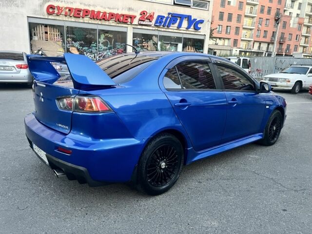 Синій Міцубісі Lancer, об'ємом двигуна 2 л та пробігом 259 тис. км за 6495 $, фото 1 на Automoto.ua