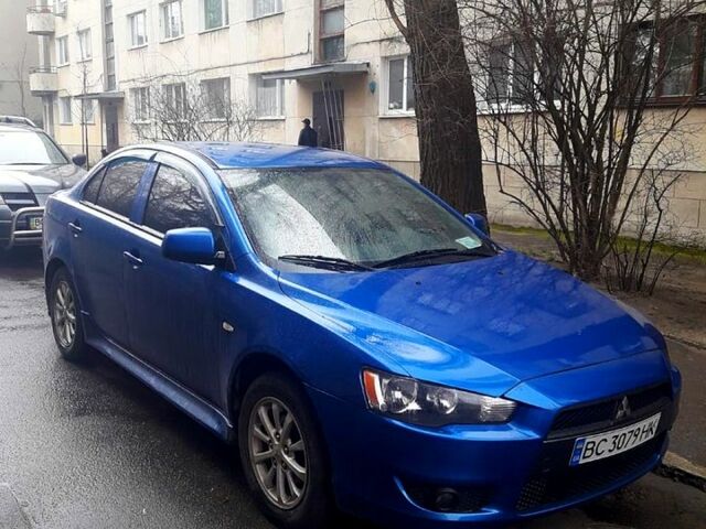 Синий Мицубиси Лансер, объемом двигателя 1.5 л и пробегом 315 тыс. км за 6000 $, фото 1 на Automoto.ua