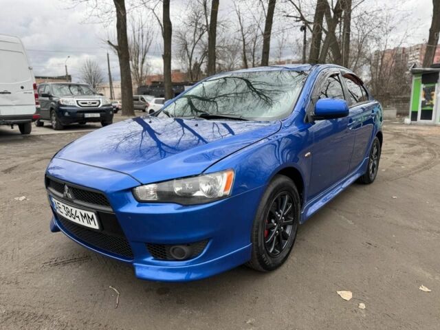 Синий Мицубиси Лансер, объемом двигателя 2 л и пробегом 170 тыс. км за 6500 $, фото 1 на Automoto.ua