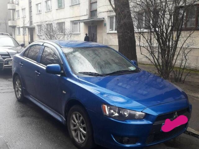 Синий Мицубиси Лансер, объемом двигателя 1.5 л и пробегом 315 тыс. км за 6000 $, фото 1 на Automoto.ua