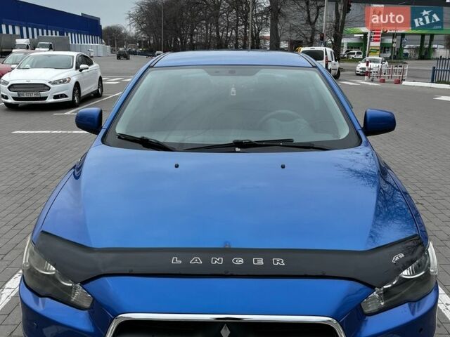 Синій Міцубісі Lancer, об'ємом двигуна 1.6 л та пробігом 230 тис. км за 7200 $, фото 1 на Automoto.ua