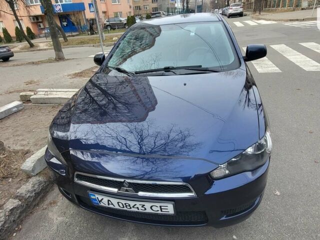 Синій Міцубісі Lancer, об'ємом двигуна 2 л та пробігом 150 тис. км за 8500 $, фото 1 на Automoto.ua