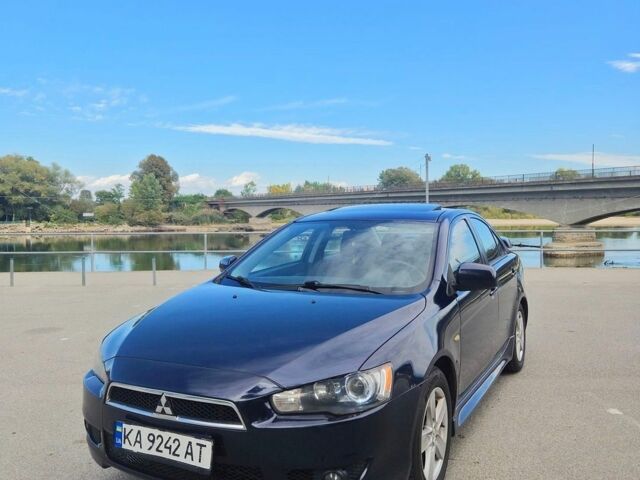 Синій Міцубісі Lancer, об'ємом двигуна 2 л та пробігом 243 тис. км за 6000 $, фото 1 на Automoto.ua