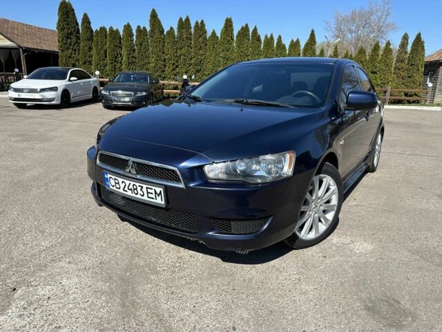 Синий Мицубиси Лансер, объемом двигателя 2 л и пробегом 232 тыс. км за 7200 $, фото 1 на Automoto.ua