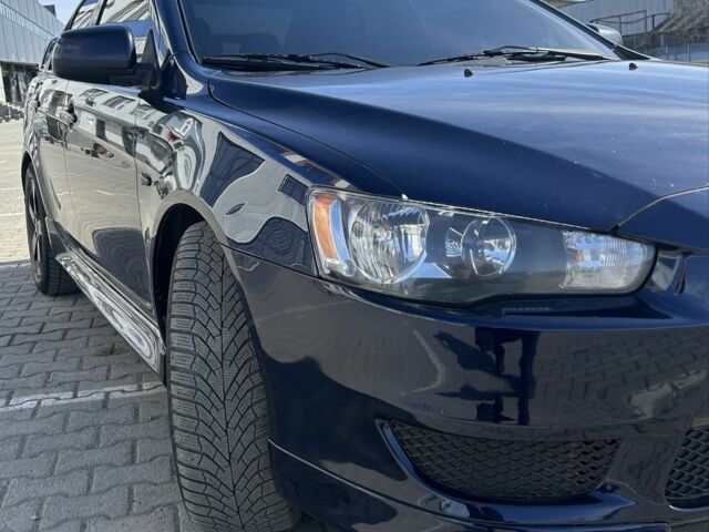 Синій Міцубісі Lancer, об'ємом двигуна 2 л та пробігом 170 тис. км за 7950 $, фото 1 на Automoto.ua