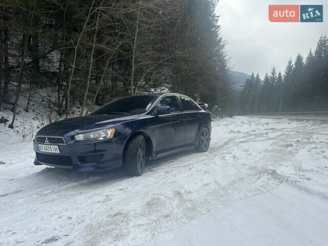 Синий Мицубиси Лансер, объемом двигателя 2 л и пробегом 168 тыс. км за 9555 $, фото 1 на Automoto.ua