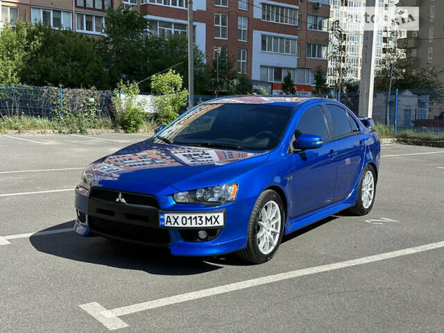 Синій Міцубісі Lancer, об'ємом двигуна 2 л та пробігом 113 тис. км за 10500 $, фото 1 на Automoto.ua