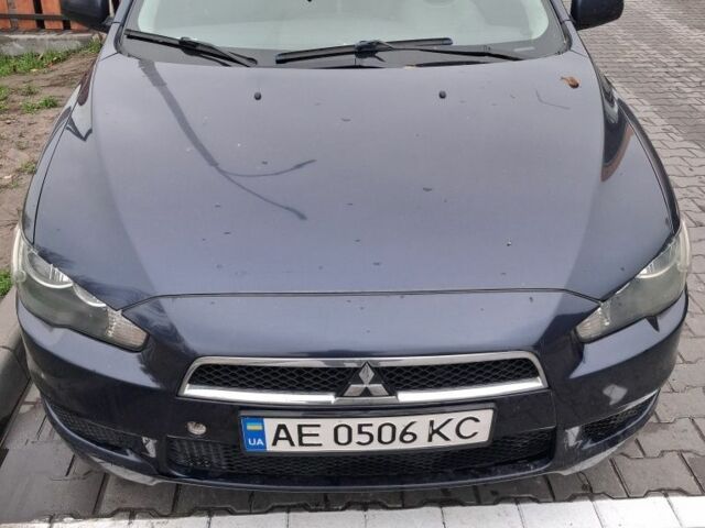 Синий Мицубиси Лансер, объемом двигателя 2 л и пробегом 233 тыс. км за 7000 $, фото 1 на Automoto.ua