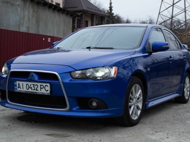 Синій Міцубісі Lancer, об'ємом двигуна 2 л та пробігом 216 тис. км за 7800 $, фото 1 на Automoto.ua