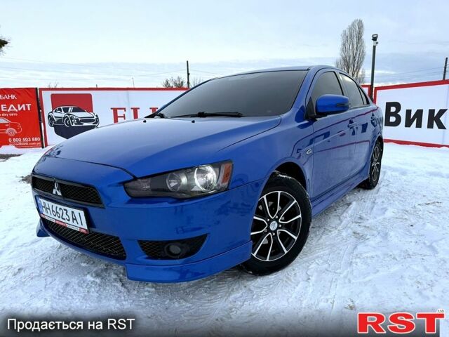 Синий Мицубиси Лансер, объемом двигателя 2 л и пробегом 0 тыс. км за 10500 $, фото 1 на Automoto.ua