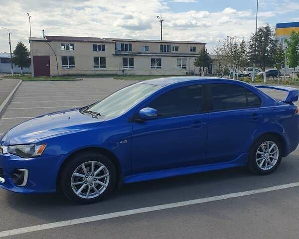 Синій Міцубісі Lancer, об'ємом двигуна 2 л та пробігом 153 тис. км за 8500 $, фото 1 на Automoto.ua