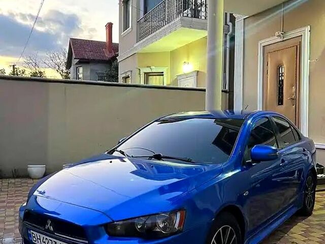 Синій Міцубісі Lancer, об'ємом двигуна 2 л та пробігом 125 тис. км за 9300 $, фото 1 на Automoto.ua