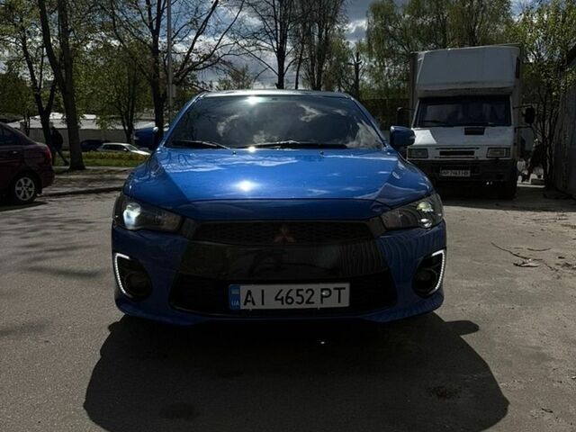 Синій Міцубісі Lancer, об'ємом двигуна 2 л та пробігом 131 тис. км за 8650 $, фото 1 на Automoto.ua