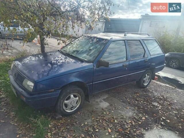 Синий Мицубиси Лансер, объемом двигателя 0 л и пробегом 322 тыс. км за 650 $, фото 1 на Automoto.ua