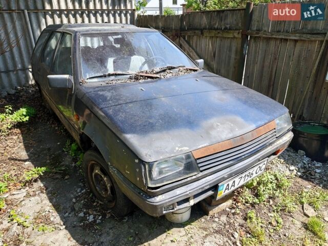 Синій Міцубісі Lancer, об'ємом двигуна 1.5 л та пробігом 400 тис. км за 222 $, фото 1 на Automoto.ua