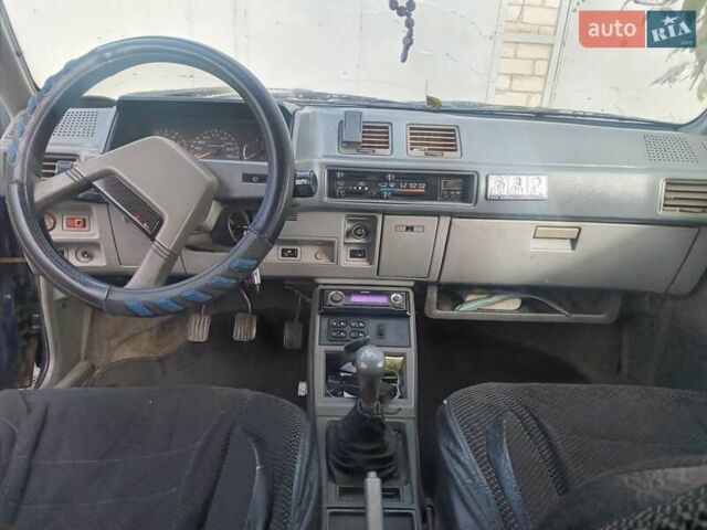 Синий Мицубиси Лансер, объемом двигателя 0 л и пробегом 330 тыс. км за 450 $, фото 1 на Automoto.ua