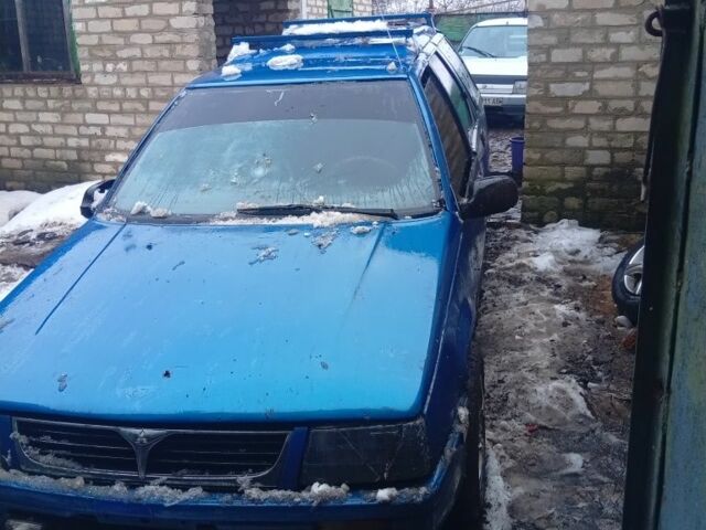 Синий Мицубиси Лансер, объемом двигателя 0 л и пробегом 300 тыс. км за 489 $, фото 1 на Automoto.ua