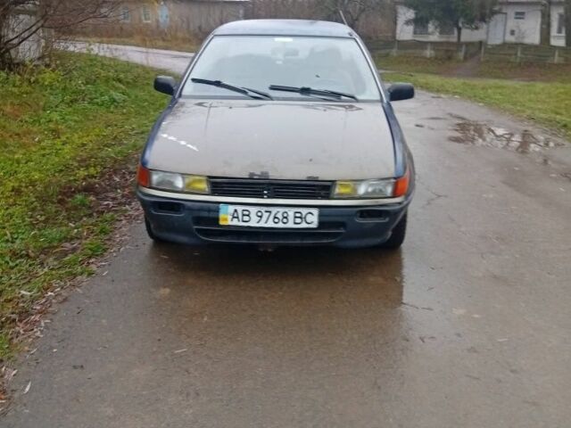 Синій Міцубісі Lancer, об'ємом двигуна 1.6 л та пробігом 3 тис. км за 500 $, фото 1 на Automoto.ua