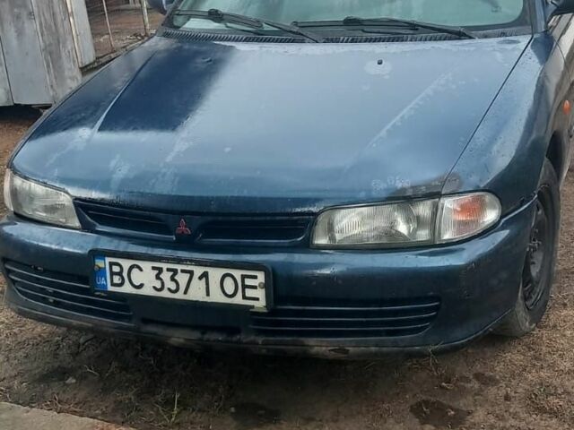 Синий Мицубиси Лансер, объемом двигателя 2 л и пробегом 1 тыс. км за 559 $, фото 1 на Automoto.ua