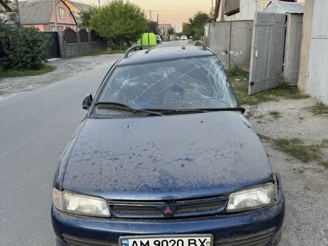 Синий Мицубиси Лансер, объемом двигателя 1.6 л и пробегом 999 тыс. км за 594 $, фото 1 на Automoto.ua