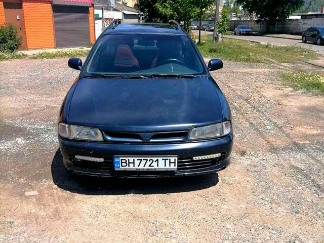 Синий Мицубиси Лансер, объемом двигателя 1.6 л и пробегом 225 тыс. км за 1100 $, фото 1 на Automoto.ua